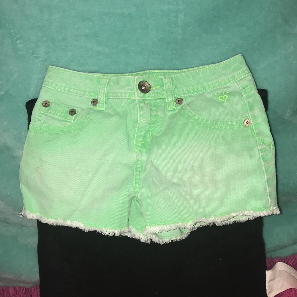 Green denim shorts